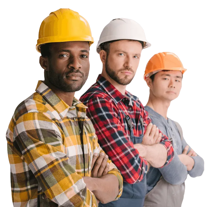 Construction workers reviewing plans on a job site